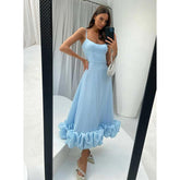 Vestidos de noche formales largos con tirantes finos y volantes redondos