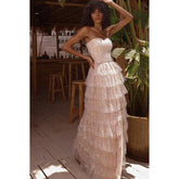 Vestido de fiesta brillante con hombros descubiertos, sin mangas y abertura lateral