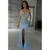 Robe de bal élégante et luxueuse, entièrement perlée, décolleté en V profond, fente latérale, sans manches