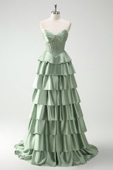Robe de bal longue vert pailleté coupe trapèze à corset à volants
