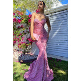 Robe de soirée sirène/trompette à paillettes et dos nu avec fermeture éclair