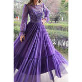 Robe de soirée trapèze à manches longues et dentelle