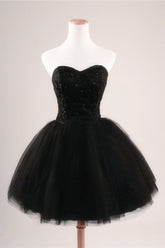 Robe de bal noire bustier en tulle pour les fêtes de fin d'année
