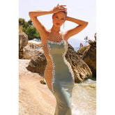 Vestido de fiesta de sirena glamuroso y dramático sin mangas con cuentas