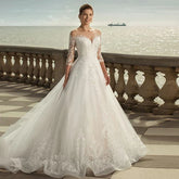 MACDUGAL Exquisite Three-Quarter Sleeves Mopping O-Neck Lace Charming Applique Back Lace Double Button Wedding Dress