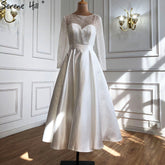 White A-Line Satin Sexy Cocktail Dresses 2025 Long Sleeves Glitter Tea-Length Party Gowns LA70922