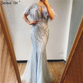 On Sale no return no refundSale Silver Feathers Shawl Yarn Sexy Evening Dresses 2025 Dubai Mermaid V-Neck Beading Diamond Formal Dress LA70355