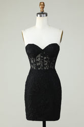 Robe de bal courte noire moulante à bustier cœur et corset ornée d'appliqués