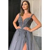 Robe longue de soirée trapèze en tulle à col en V et perles avec fente