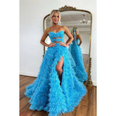 Robe de bal trapèze en tulle sans bretelles avec fente
