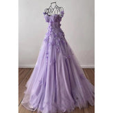 Robe de soirée trapèze glamour et spectaculaire, épaules dénudées, sans manches, avec appliques