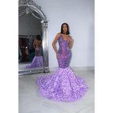 Vestido de fiesta largo estilo sirena con escote en V, tirantes finos y apliques de lentejuelas