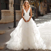 Robe de mariée sexy en organza, dos nu, coupe trapèze, décolleté en V, sans manches, bretelles spaghetti simples, pour la mariée