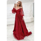 Vestido de fiesta brillante con mangas largas y tirantes finos