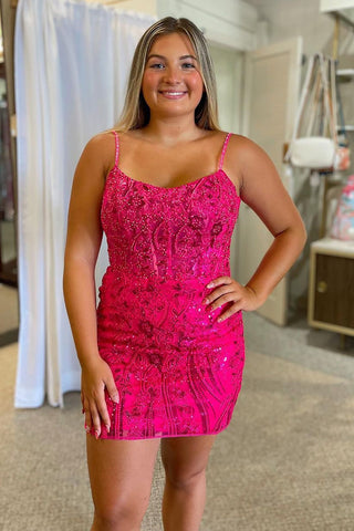 Robe de bal élégante rose fuchsia à bretelles spaghetti et corset, ornée d'appliqués