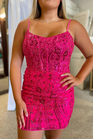 Robe de bal élégante rose fuchsia à bretelles spaghetti et corset, ornée d'appliqués