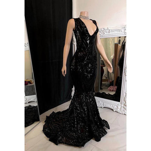 Robe de soirée sirène glamour et spectaculaire à paillettes sans manches