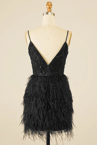 Robe de bal moulante à paillettes et plumes