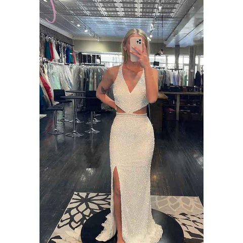 Vestido de fiesta largo con escote en V, lentejuelas, aberturas y tirantes cruzados