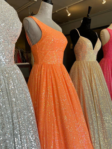 Vestido de fiesta de lentejuelas con un solo hombro, corte en A y bolsillos