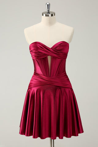 Robe de bal tendance fuchsia à bustier cœur en satin et corset trapèze