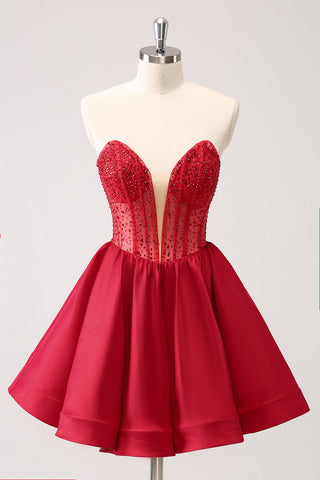 Robe de bal rouge mignonne, coupe trapèze, bustier, corset à volants et perles