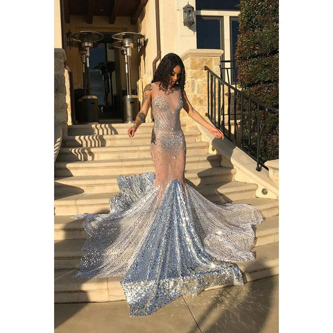 Vestido de fiesta largo estilo sirena de tul transparente con cuentas y sin mangas con cola larga