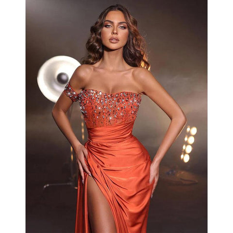 Robe de soirée longue bustier à perles et fente 