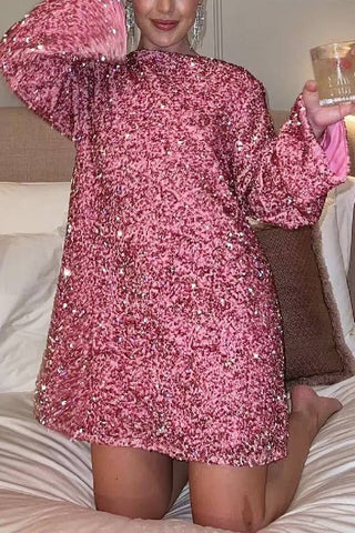 Vestido corto suelto con lentejuelas y lazo en la espalda para bailar toda la noche 