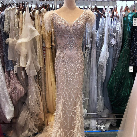 Champagne Luxury V-Neck Sexy Mermaid Evening Dresses 2025 Diamond Feathers Sleeveless Formal Dress LA70350