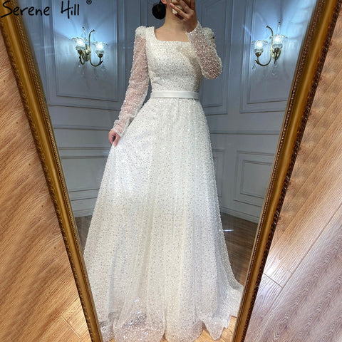 Dubai White A-Line Sexy Luxury Evening Dresses 2025 Beading Long Sleeve Sexy Formal Dress LA70271