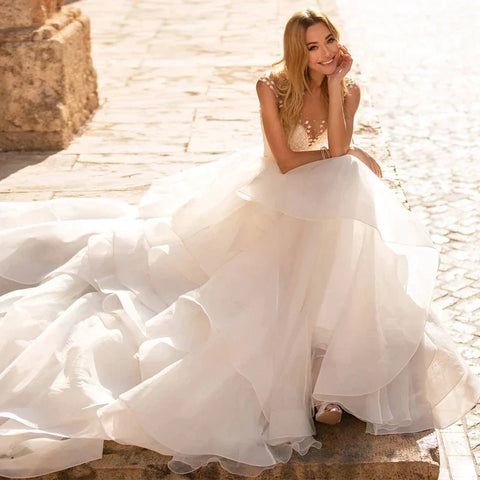 Elegant Sweetheart Wedding Dresses 2024 Applique Flowers Sleeveless Illusion Back Tiered Ball Gowns Court Train Vestido De Novia