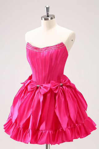 Robe de bal courte fuchsia tendance, sans bretelles, en satin, coupe trapèze, avec nœud.