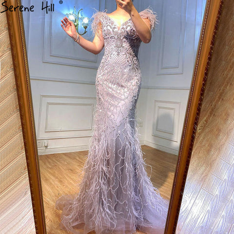 Champagne Luxury V-Neck Sexy Mermaid Evening Dresses 2025 Diamond Feathers Sleeveless Formal Dress LA70350