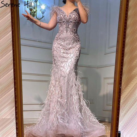 Champagne Luxury V-Neck Sexy Mermaid Evening Dresses 2025 Diamond Feathers Sleeveless Formal Dress LA70350