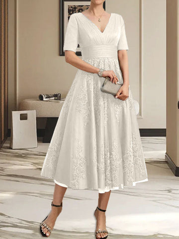 Vestido de tul y encaje para la madre de la novia, corte en A, escote en V, largo hasta la rodilla, con pliegues