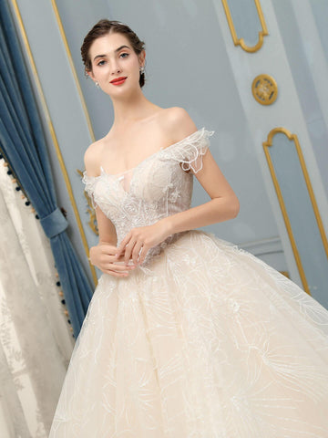 Robe de mariée de style bal, luxueuse, perlée, épaules dénudées, longueur au sol, manches courtes 