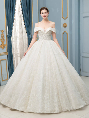Robe de mariée longue en tulle, dentelle et perles, sans manches, longueur au sol 