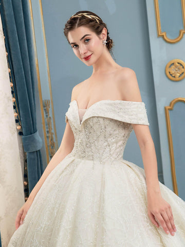 Robe de mariée longue en tulle, dentelle et perles, sans manches, longueur au sol 