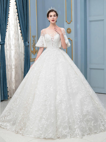 Robe de mariée longue en dentelle et perles, sans manches, longueur au sol 