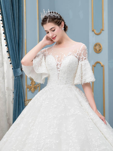 Robe de mariée longue en dentelle et perles, sans manches, longueur au sol 