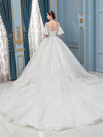 Robe de mariée longue en dentelle et perles, sans manches, longueur au sol 