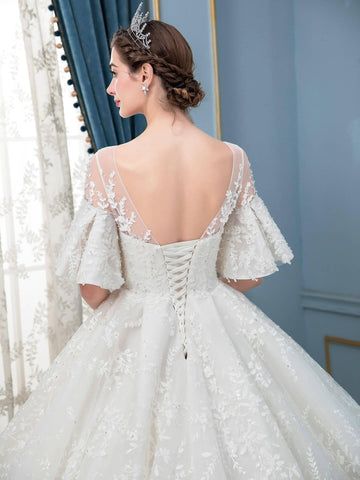 Robe de mariée longue en dentelle et perles, sans manches, longueur au sol 