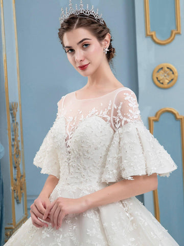 Robe de mariée longue en dentelle et perles, sans manches, longueur au sol 