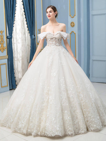 Robe de mariée de style bal, luxueuse, perlée, longueur au sol, épaules dénudées, manches courtes 