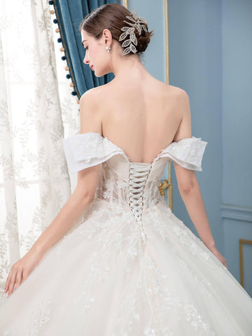 Robe de mariée de style bal, luxueuse, perlée, longueur au sol, épaules dénudées, manches courtes 