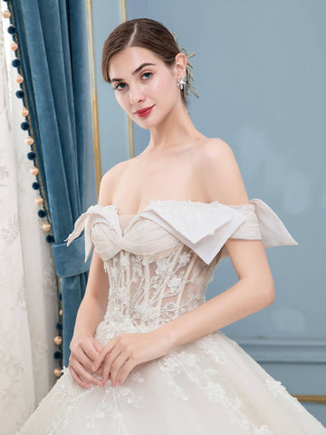 Robe de mariée de style bal, luxueuse, perlée, longueur au sol, épaules dénudées, manches courtes 