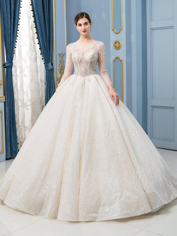 Robe de mariée de style bal, luxueuse, perlée, longueur au sol, manches longues 