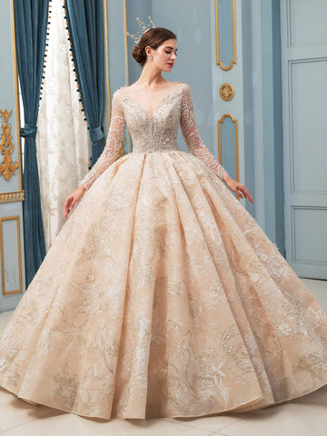 Robe de mariée de style bal, luxueuse, perlée à la main, longueur au sol, manches longues, avec longue traîne 