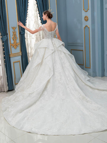 Robe de mariée de style bal, luxueuse, perlée à la main, longueur au sol, manches courtes, avec longue traîne 